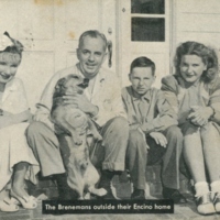 Tom Breneman with his family outside their Encino home.